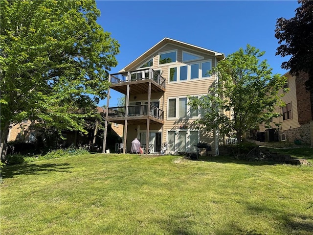 14 Emerald Shore Dr, Lake Tapawingo, MO 64015 - back of house featuring a balcony and a lawn