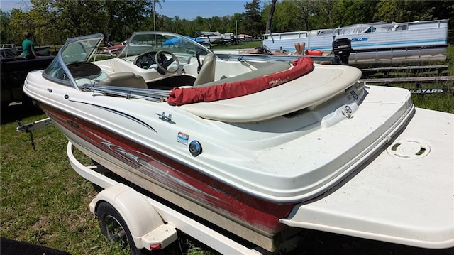 14 Emerald Shore Dr, Lake Tapawingo, MO 64015 - view of vehicle parking featuring view of scattered trees