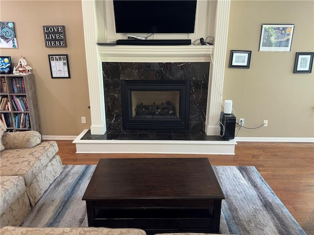 14 Emerald Shore Dr, Lake Tapawingo, MO 64015 - living area with wood finished floors and a fireplace
