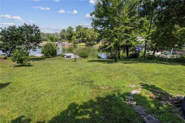 14 Emerald Shore Dr, Lake Tapawingo, MO 64015 - view of green lawn with a water view