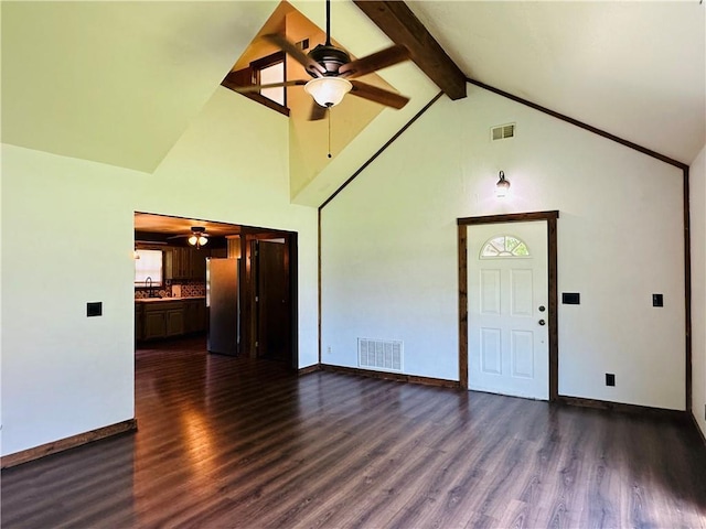 801 N Cayuga St, Frontenac, KS 66763 - unfurnished living room featuring ceiling fan, high vaulted ceiling, dark wood finished floors, and beamed ceiling