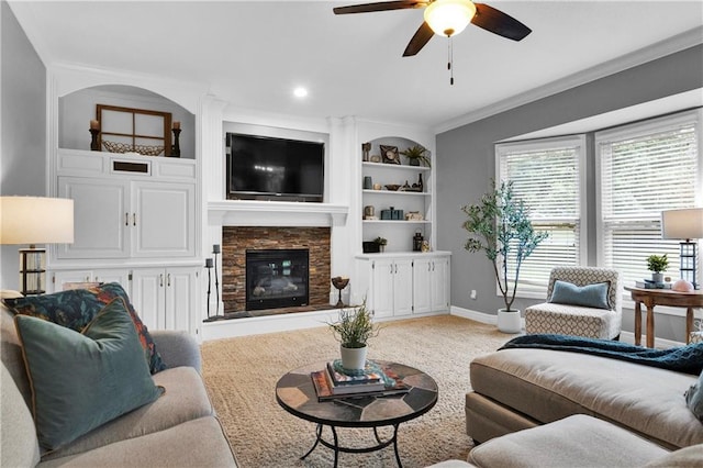 21511 W 100th Ter, Lenexa, KS 66220 - living room with a ceiling fan, baseboards, a fireplace, built in features, and ornamental molding