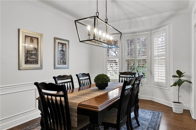 21511 W 100th Ter, Lenexa, KS 66220 - dining area with a chandelier, ornamental molding, dark wood finished floors, and baseboards