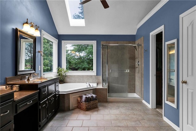 21511 W 100th Ter, Lenexa, KS 66220 - bathroom with ceiling fan, vanity, a bath, a shower stall, and lofted ceiling