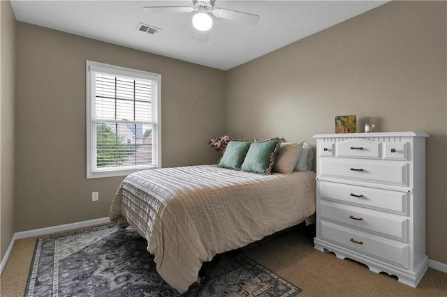 21511 W 100th Ter, Lenexa, KS 66220 - bedroom featuring carpet floors, baseboards, and a ceiling fan