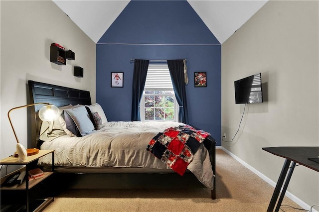 21511 W 100th Ter, Lenexa, KS 66220 - bedroom with lofted ceiling, carpet, and baseboards