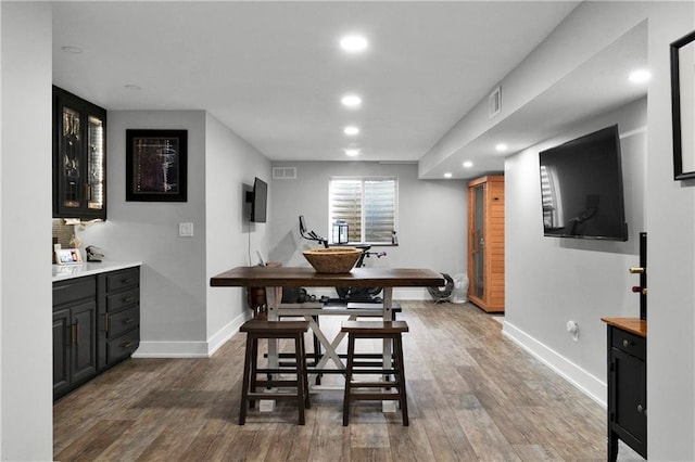 21511 W 100th Ter, Lenexa, KS 66220 - dining area featuring recessed lighting, baseboards, and wood finished floors