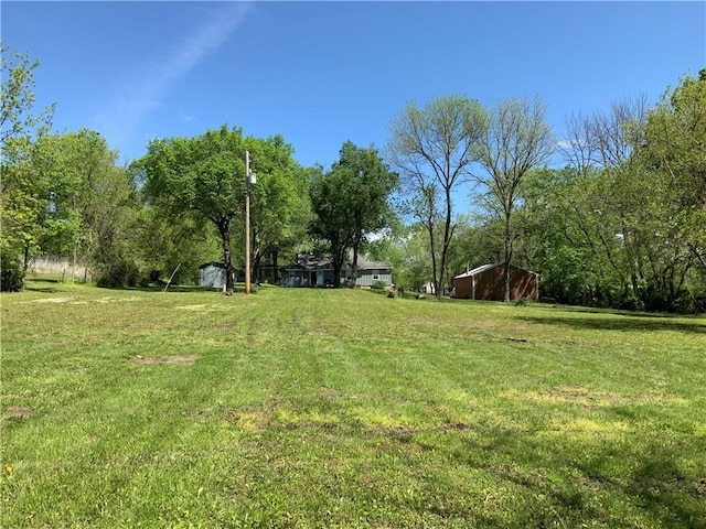 8480 NW High St Unit B, Amsterdam, MO 64723 - view of yard featuring an outdoor structure