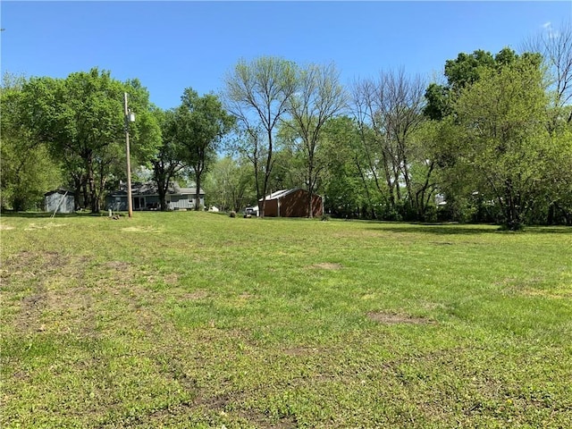 8480 NW High St Unit B, Amsterdam, MO 64723 - view of yard with a storage unit and an outdoor structure