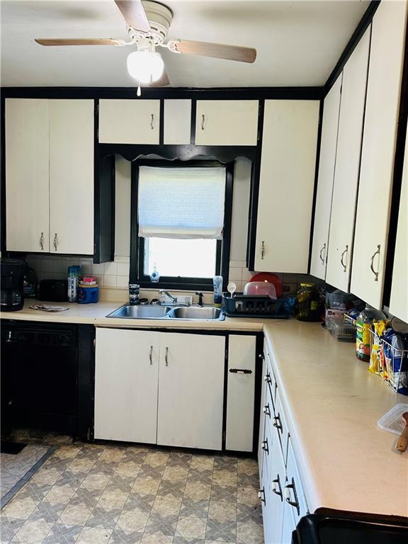 8480 NW High St Unit B, Amsterdam, MO 64723 - kitchen with a sink, ceiling fan, dishwasher, and light countertops