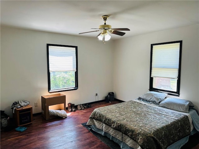 8480 NW High St Unit B, Amsterdam, MO 64723 - bedroom with baseboards, a ceiling fan, and wood finished floors