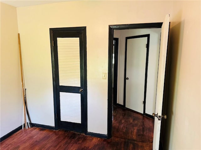 8480 NW High St Unit B, Amsterdam, MO 64723 - interior space featuring baseboards and dark wood-type flooring