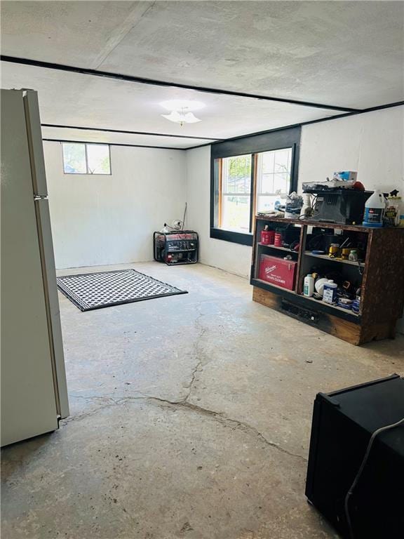 8480 NW High St Unit B, Amsterdam, MO 64723 - below grade area featuring freestanding refrigerator