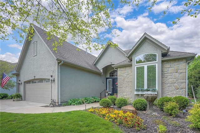 2945 W 143rd Ter, Leawood, KS 66224 - view of front of property with stone siding, stucco siding, concrete driveway, and a shingled roof