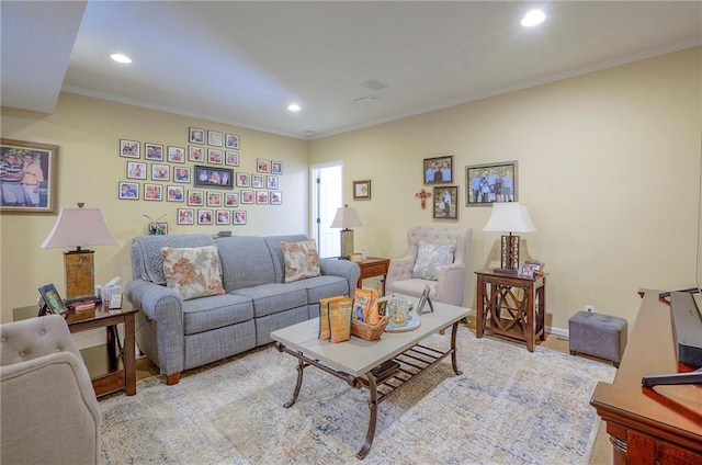2945 W 143rd Ter, Leawood, KS 66224 - living room featuring recessed lighting, crown molding, and light wood-type flooring
