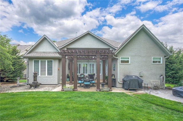 2945 W 143rd Ter, Leawood, KS 66224 - back of house with a pergola, a patio, stucco siding, a yard, and a shingled roof