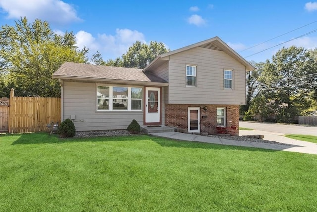 8617 W 92nd St, Overland Park, KS 66212 - split level home with brick siding, entry steps, and a shingled roof