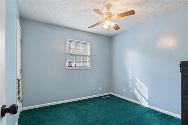 unfurnished room featuring baseboards, a textured ceiling, ceiling fan, and carpet
