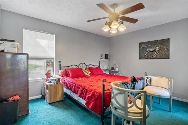 bedroom with baseboards, ceiling fan, and carpet
