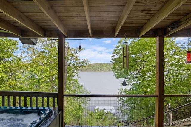 deck featuring a water view