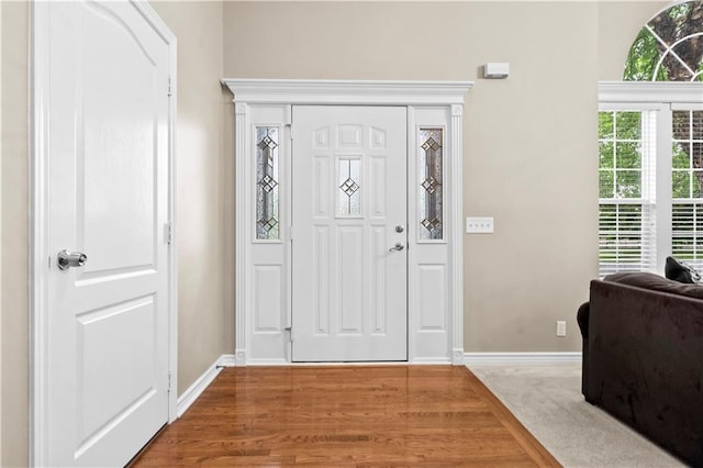 18461 W 157th St, Olathe, KS 66062 - foyer featuring baseboards and wood finished floors