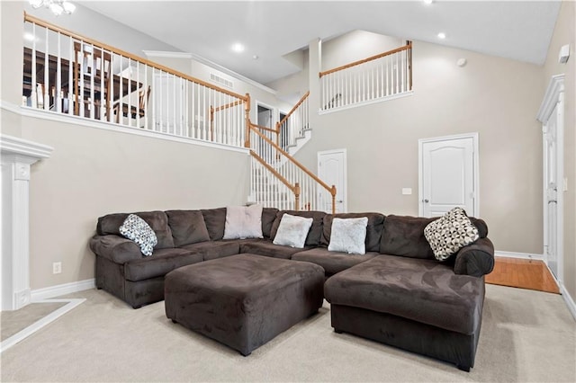 18461 W 157th St, Olathe, KS 66062 - living area featuring a high ceiling, carpet floors, stairway, and recessed lighting