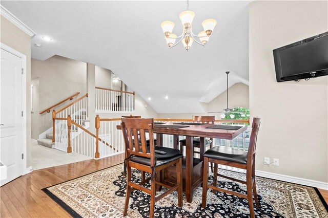 18461 W 157th St, Olathe, KS 66062 - dining area with hardwood / wood-style flooring, a chandelier, recessed lighting, and vaulted ceiling