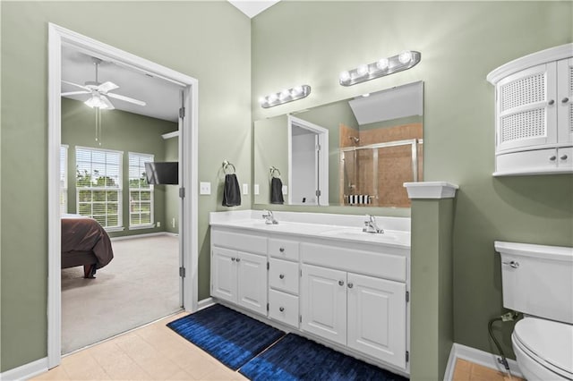 18461 W 157th St, Olathe, KS 66062 - ensuite bathroom with a ceiling fan, double vanity, and a shower stall