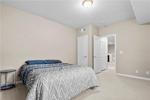 18461 W 157th St, Olathe, KS 66062 - bedroom with light colored carpet and a textured ceiling