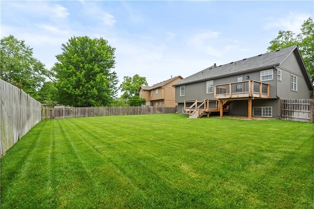 18461 W 157th St, Olathe, KS 66062 - fenced backyard featuring stairs and a wooden deck