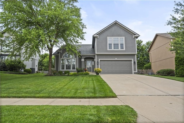 18461 W 157th St, Olathe, KS 66062 - traditional-style home with a garage, concrete driveway, a front yard, and stucco siding