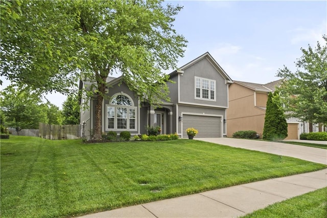 18461 W 157th St, Olathe, KS 66062 - traditional-style home with concrete driveway, a garage, and stucco siding
