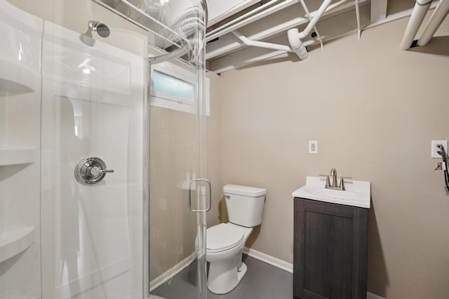 8020 Yecker Ave, Kansas City, KS 66109 - bathroom featuring a stall shower, toilet, baseboards, and vanity