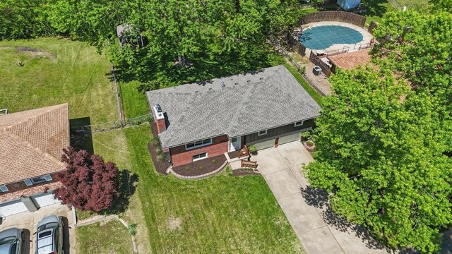 8020 Yecker Ave, Kansas City, KS 66109 - view from above of property featuring a pool area