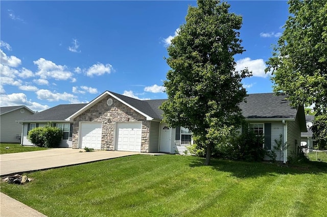 ranch-style home featuring a front yard, driveway, a garage, and stone siding