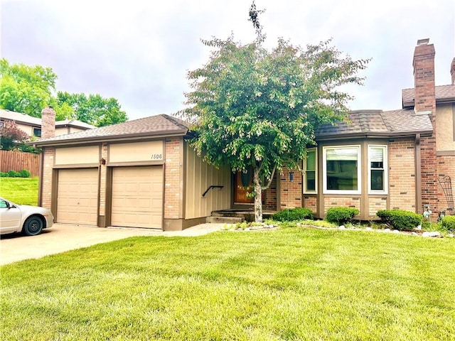single story home featuring a garage, brick siding, a front lawn, and driveway