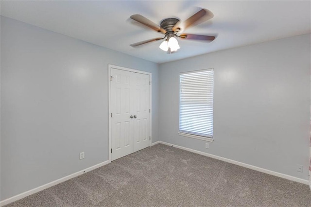 8115 NE 112th St, Kansas City, MO 64157 - unfurnished bedroom featuring carpet floors, baseboards, a closet, and ceiling fan