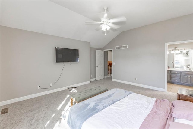 8115 NE 112th St, Kansas City, MO 64157 - bedroom featuring lofted ceiling, light carpet, baseboards, connected bathroom, and a ceiling fan