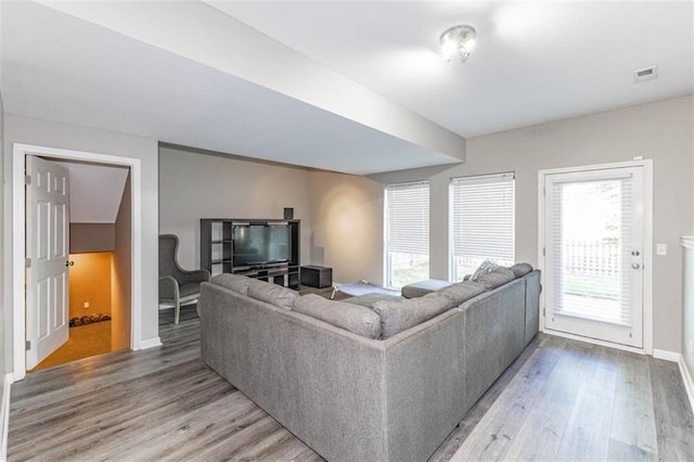 8115 NE 112th St, Kansas City, MO 64157 - living room featuring light wood-type flooring, healthy amount of natural light, and baseboards