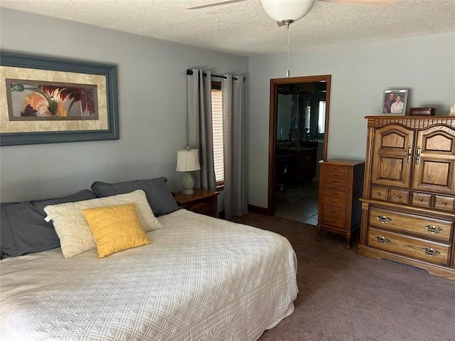 carpeted bedroom with a textured ceiling