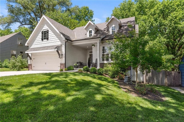 2704 W 74th St, Prairie Village, KS 66208 - view of front facade with driveway, an attached garage, a shingled roof, and brick siding