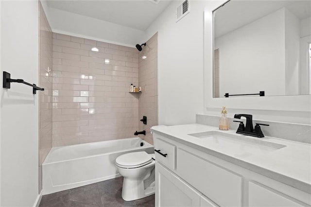 2704 W 74th St, Prairie Village, KS 66208 - bathroom featuring vanity, toilet, bathtub / shower combination, and tile patterned flooring
