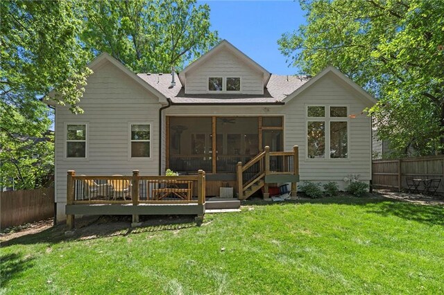 2704 W 74th St, Prairie Village, KS 66208 - rear view of house featuring a sunroom, a deck, and a shingled roof
