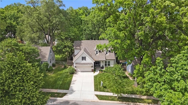 2704 W 74th St, Prairie Village, KS 66208 - view of front facade featuring driveway
