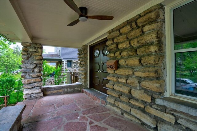 2803 Harrison St, Kansas City, MO 64109 - view of patio featuring a ceiling fan