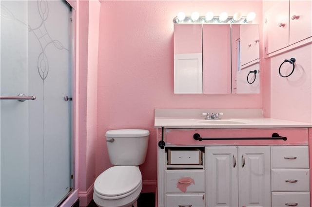 2803 Harrison St, Kansas City, MO 64109 - full bath with a shower stall, toilet, and vanity