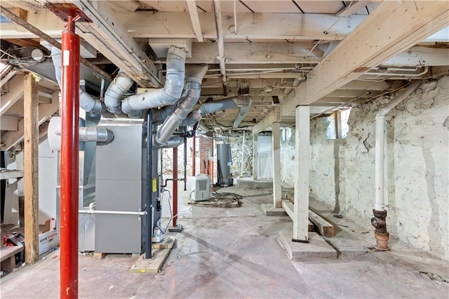 2803 Harrison St, Kansas City, MO 64109 - basement featuring gas water heater