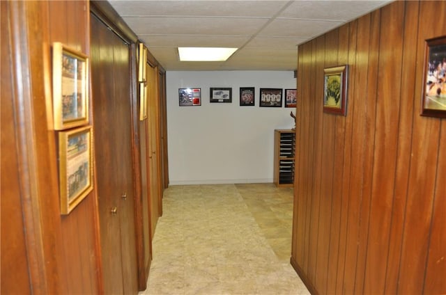 1514 Frankie Ln, Saint Joseph, MO 64503 - hallway with baseboards, light floors, and wood walls