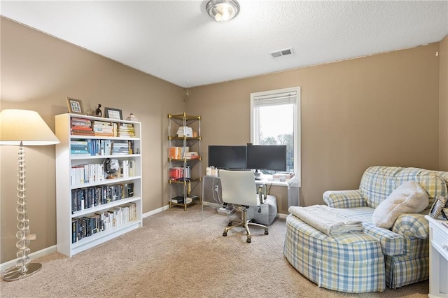 office area featuring carpet floors and baseboards