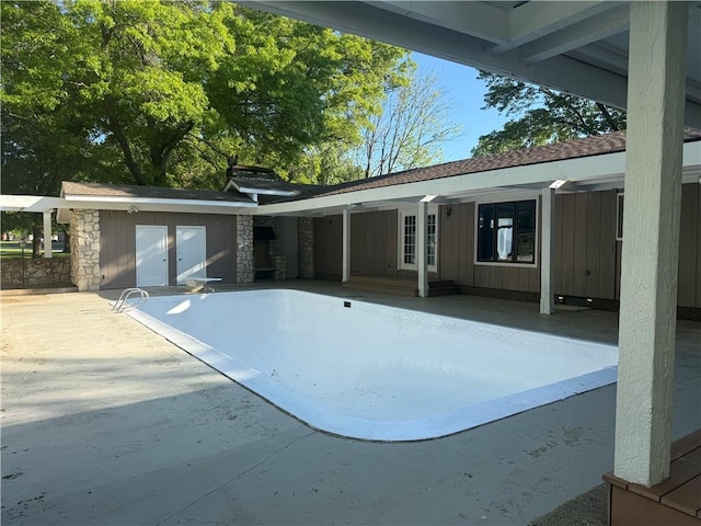 view of pool featuring a patio area